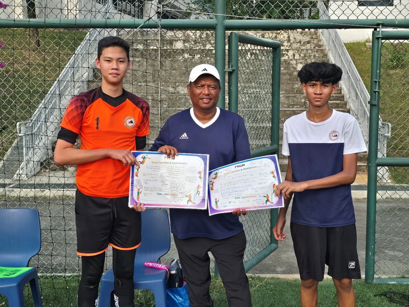 Presenting our coach with notes of appreciation